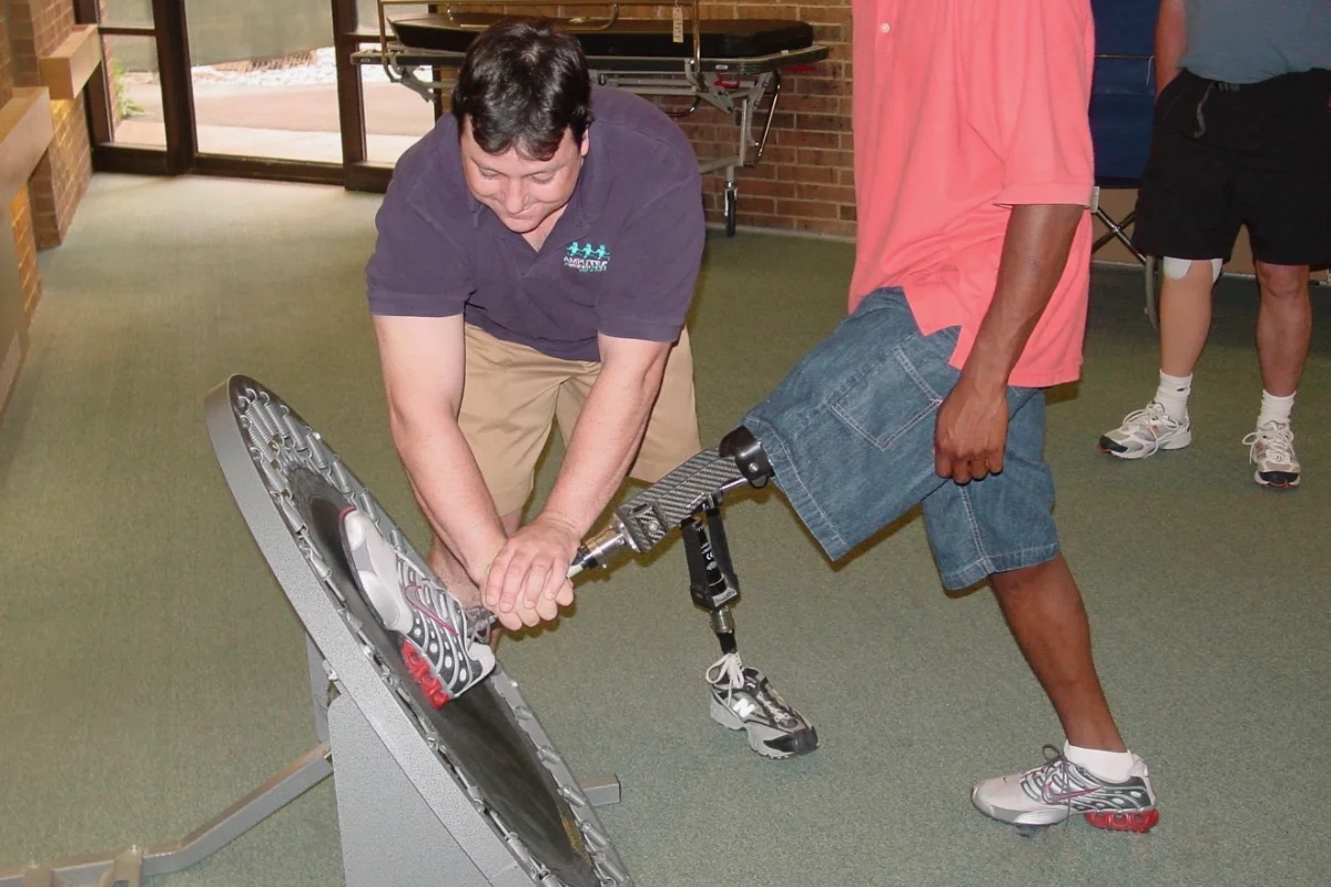 Clinician adjusting prosthetic alignment